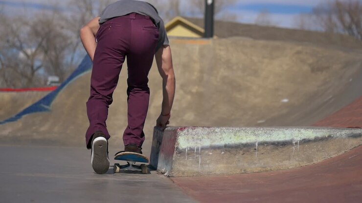 person waxes a ledge at the skatepark