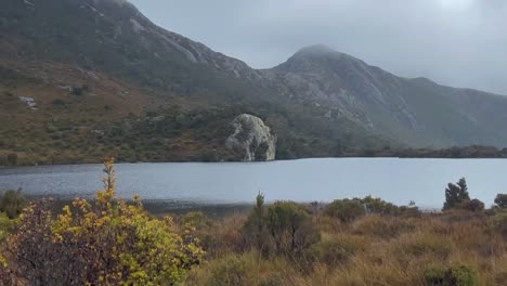 4k sweeping view of a lake and a mountain in australia on a rainy day