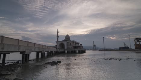 timelapse day to night transition of floating mosque