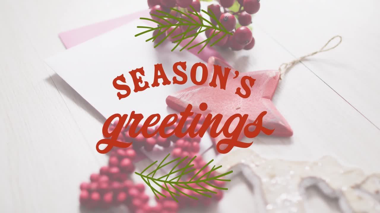Animation of seasons greetings text over christmas decorations
