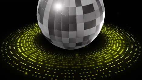 Animation-of-retro-disco-mirror-ball-and-glowing-yellow-light-on-black-background