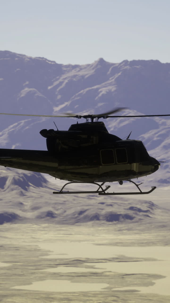 Helicopter flying over rocky landscape mountains at dusk