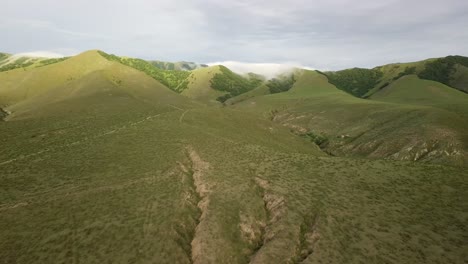 aerial panning shot across vast dique la angostura, el mollar