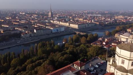 Church-of-Santa-Maria-al-Monte-dei-Cappuccini-Overlooking-River-Po-In-Turin,-Italy-With-Mole-Antonelliana-In-Distance