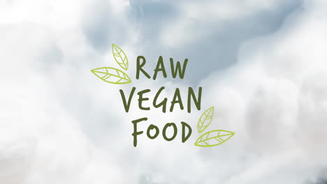 animación de texto de comida vegana cruda sobre el cielo con nubes.