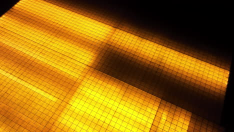 illuminated gridded ceiling at night