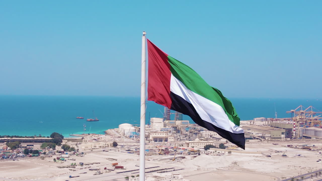 Aerial view of the Flag of the UAE, The national symbol of United Arab Emirates