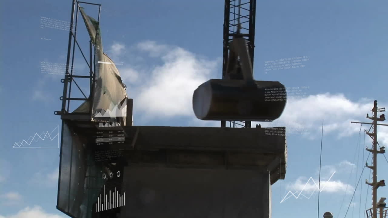 Construction site with data analytics animation over crane lifting heavy object