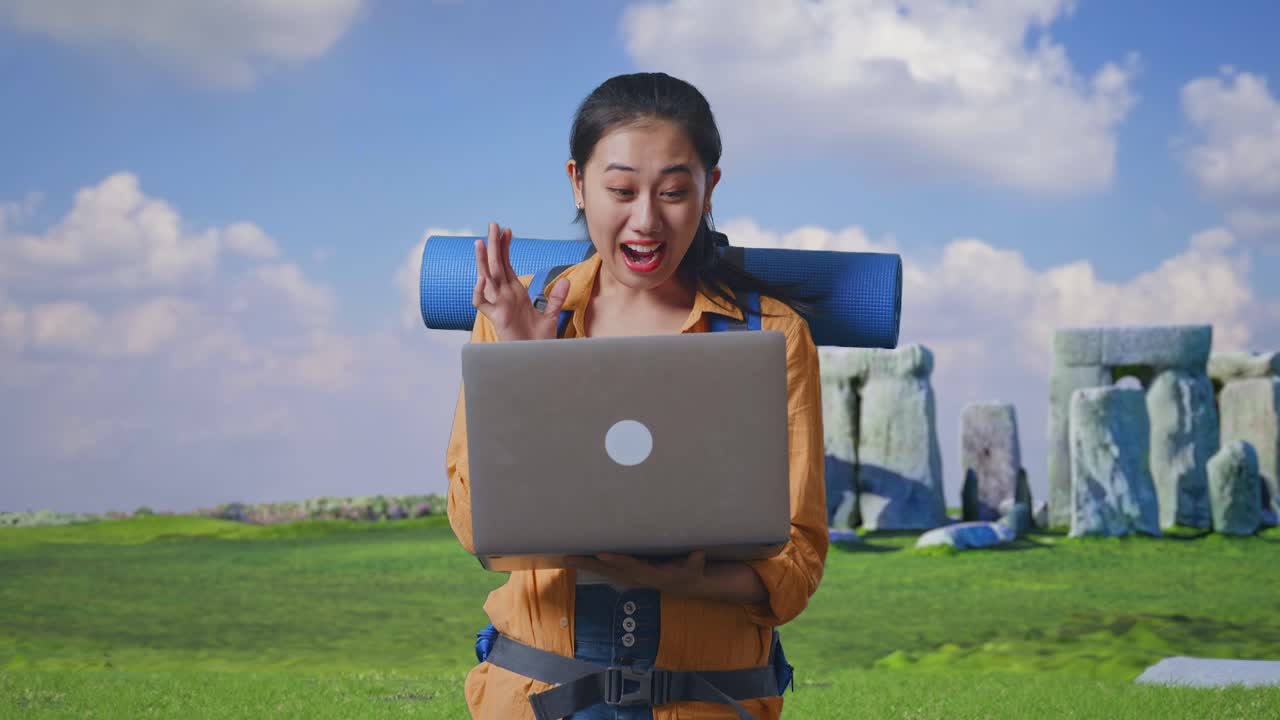 Woman with Laptop at Stonehenge