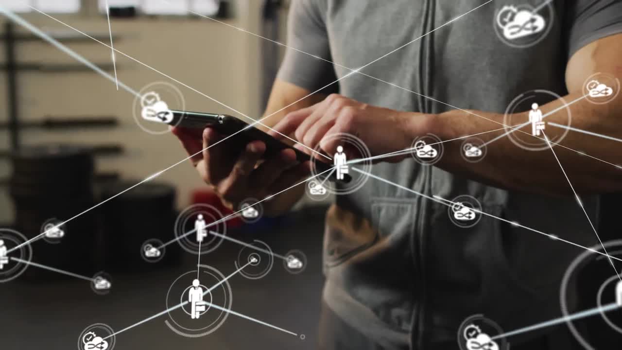 Animation of media icons over caucasian man using tablet