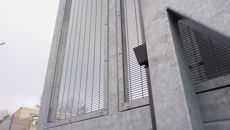 details of main gate of a prison closing in slow motion