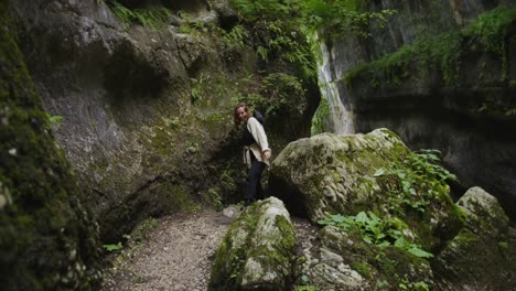 woman hiking in a mountain canyon