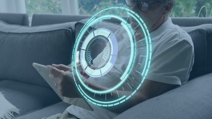 Animation of processing circle over hands of caucasian senior man using tablet