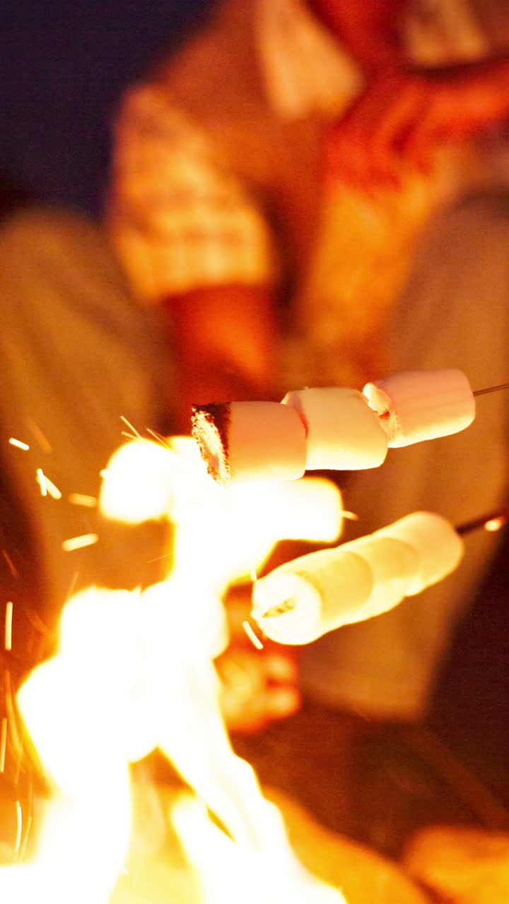Roasting marshmallows over a campfire