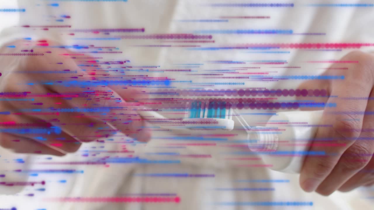 Picking up toothbrush male hands tilting adding paste preparing for oral-care streaks hiding hands