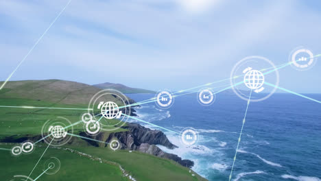 animation of network of digital icons against aerial view of a island and sea