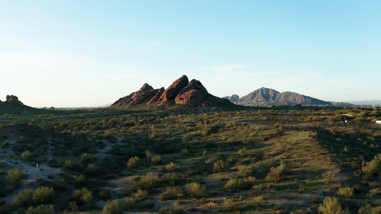 Aerial shot approaching Arizona's Papago Park at sunset.