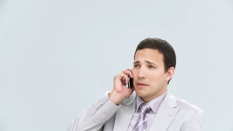 Male-executive-talking-on-phone