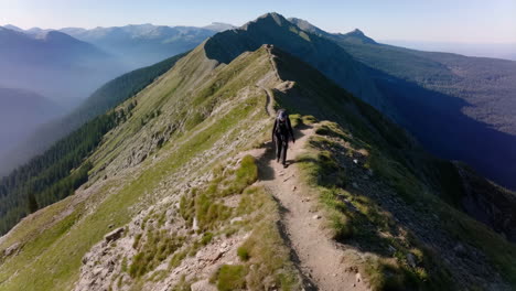 hiker on a mountain ridge