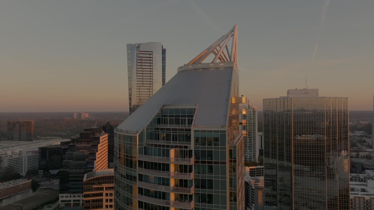 Modern residential and commercial buildings glass facade, Sovereign residential skyline building at sunset, Aerial