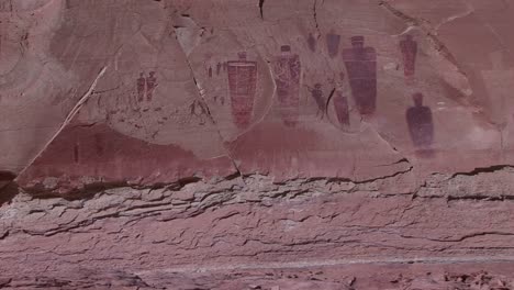 panup of remarkable american indian petroglyphs on a desert cliff