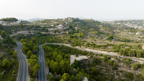 scenic winding road through a mountainous landscape