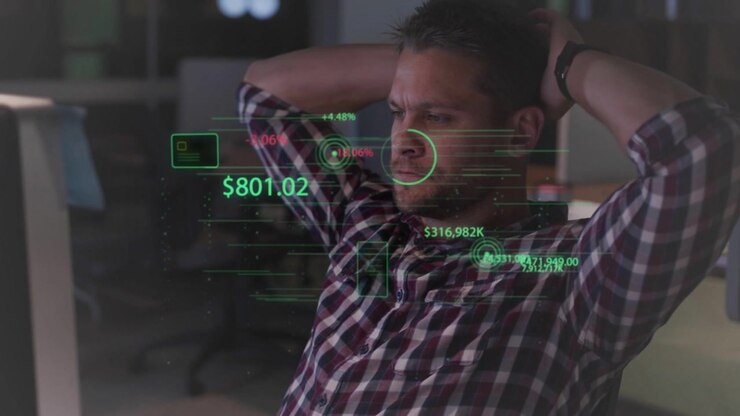 Man glancing screen sipping viewing floating finance HUD in front of him showing $801