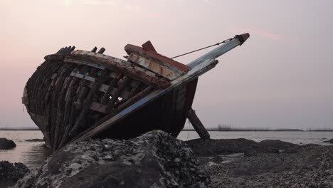 shipwreck on sunset, dolly shot.