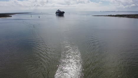 Trawler-working-the-San-Jacinto-River-and-merchant-ship-heading-in