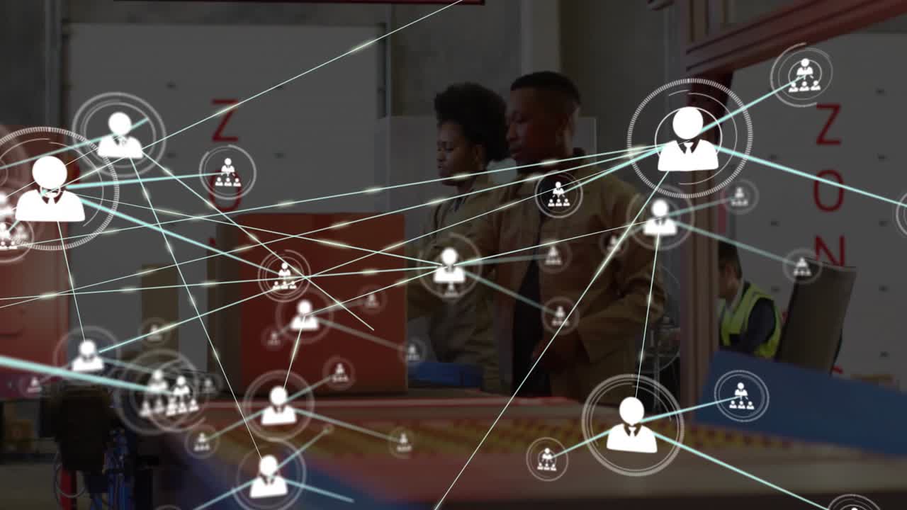 Packers scanning priority box and lifting boxes as network nodes initiating logistics connectivity