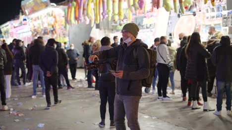photographer at a night carnival
