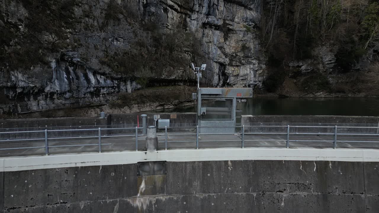 Aerial shot of a little dam in Walensee, Switzerland