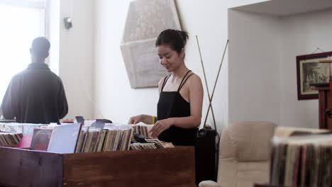 asian woman in a music store