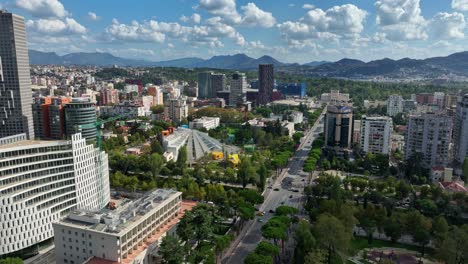 the pyramid of tirana in the cityscape of tirana, the capital of albania. aerial drone shot