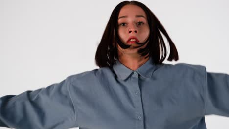woman in a gray shirt posing