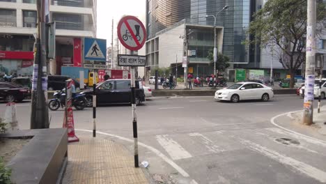 city street scene with traffic and road signs