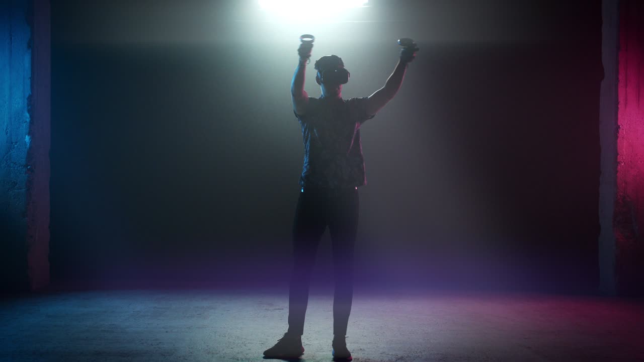 Gamer In VR Headset Circling Controllers