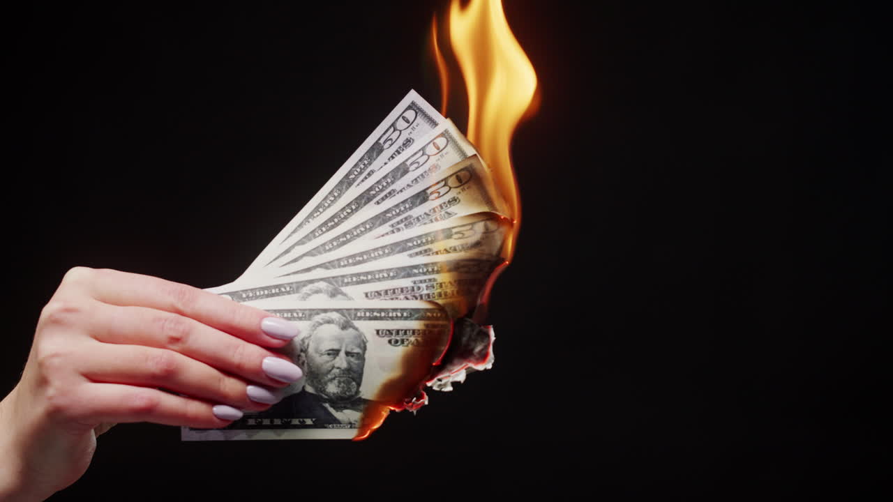 Burning Fifty Dollar Bills