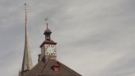 tower clock on swiss building, lucerne in switzerland