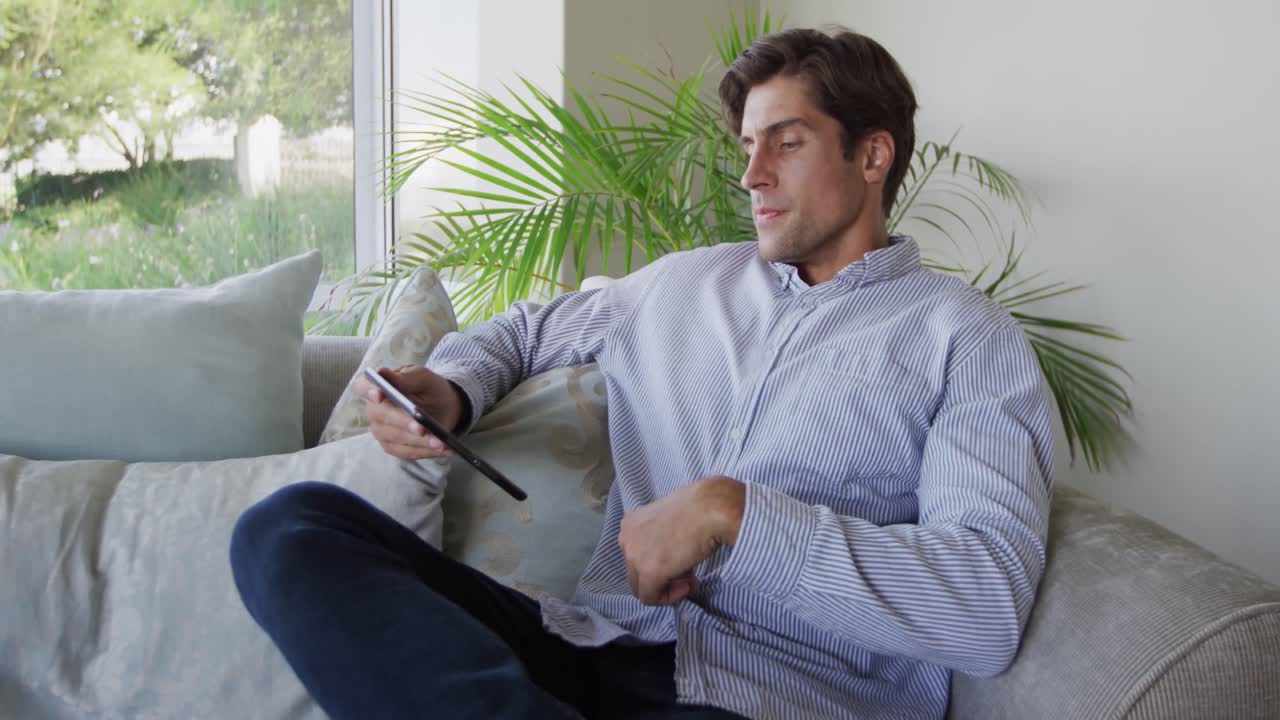 Caucasian man using a digital tablet