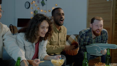 friends watching a baseball game at home