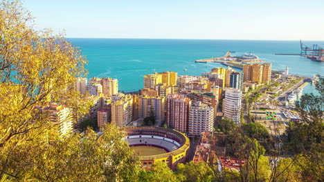 malaga and the bull fighting plaza or plaza de toros - time lapse