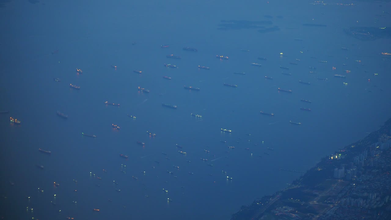 Aerial View of Ships at Dusk in a Harbor