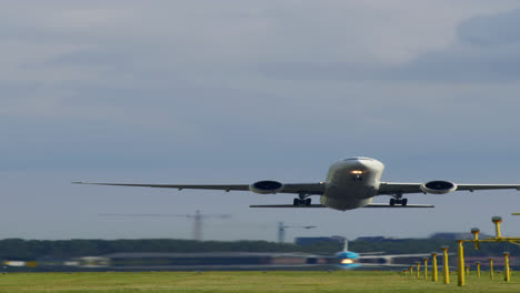 airplane taking off from airport runway