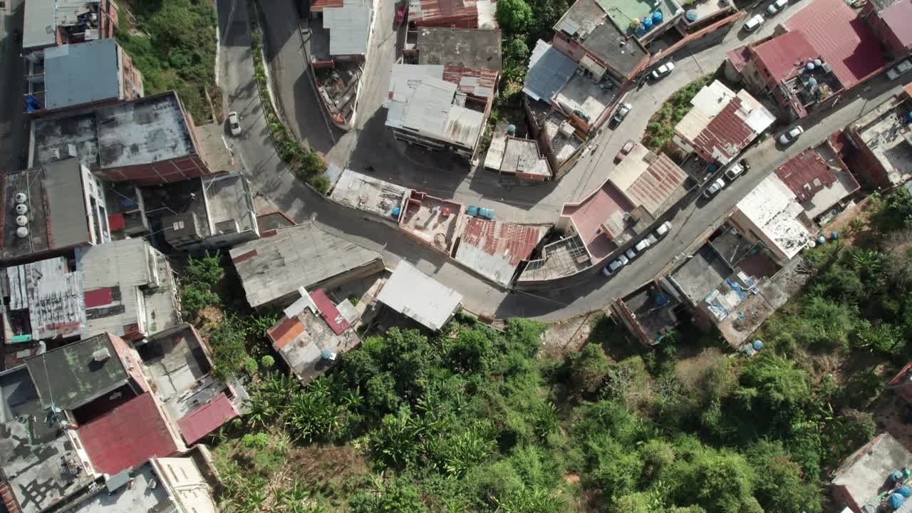 Aerial view showing the winding streets and houses in the Petare Nazareno area