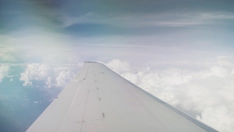 view of sky through plane window