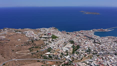 Aerial:-Panoramic-drone-shot-of-Ermoupoli-city-in-Syros-island,-Greece-on-a-sunny-day