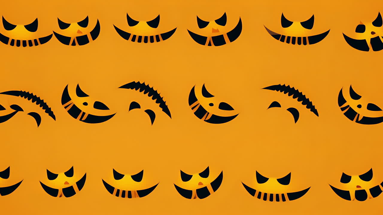animación con temática de halloween con varias caras espeluznantes en fondo naranja