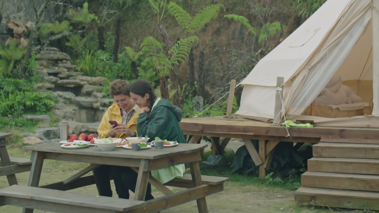 Girlfriends Taking Selfie on Dinner at Glampsite