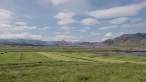 stunning icelandic landscape with mountain range in background